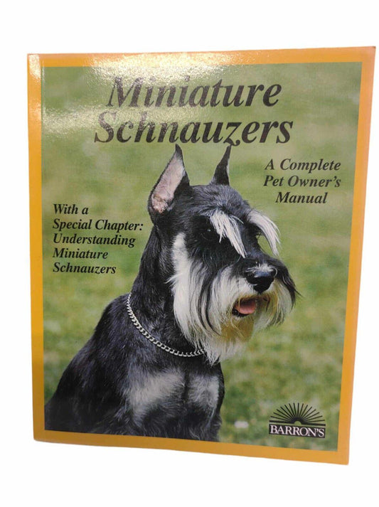 Miniature Schnauzers book cover featuring a Schnauzer dog, providing pet owner's manual insights.