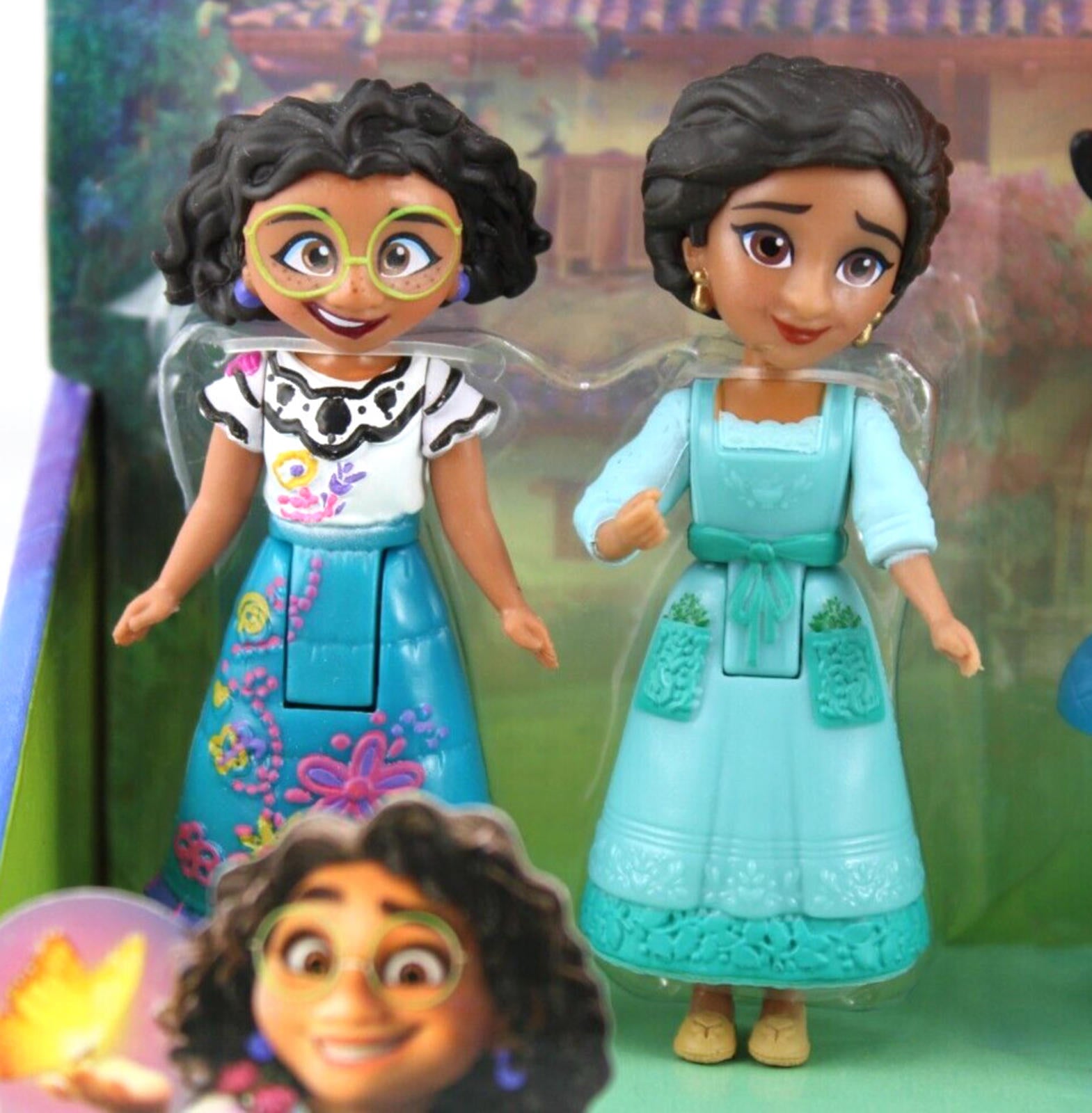 Mirabel and Isabela dolls from Encanto, featuring colorful outfits and detailed designs.