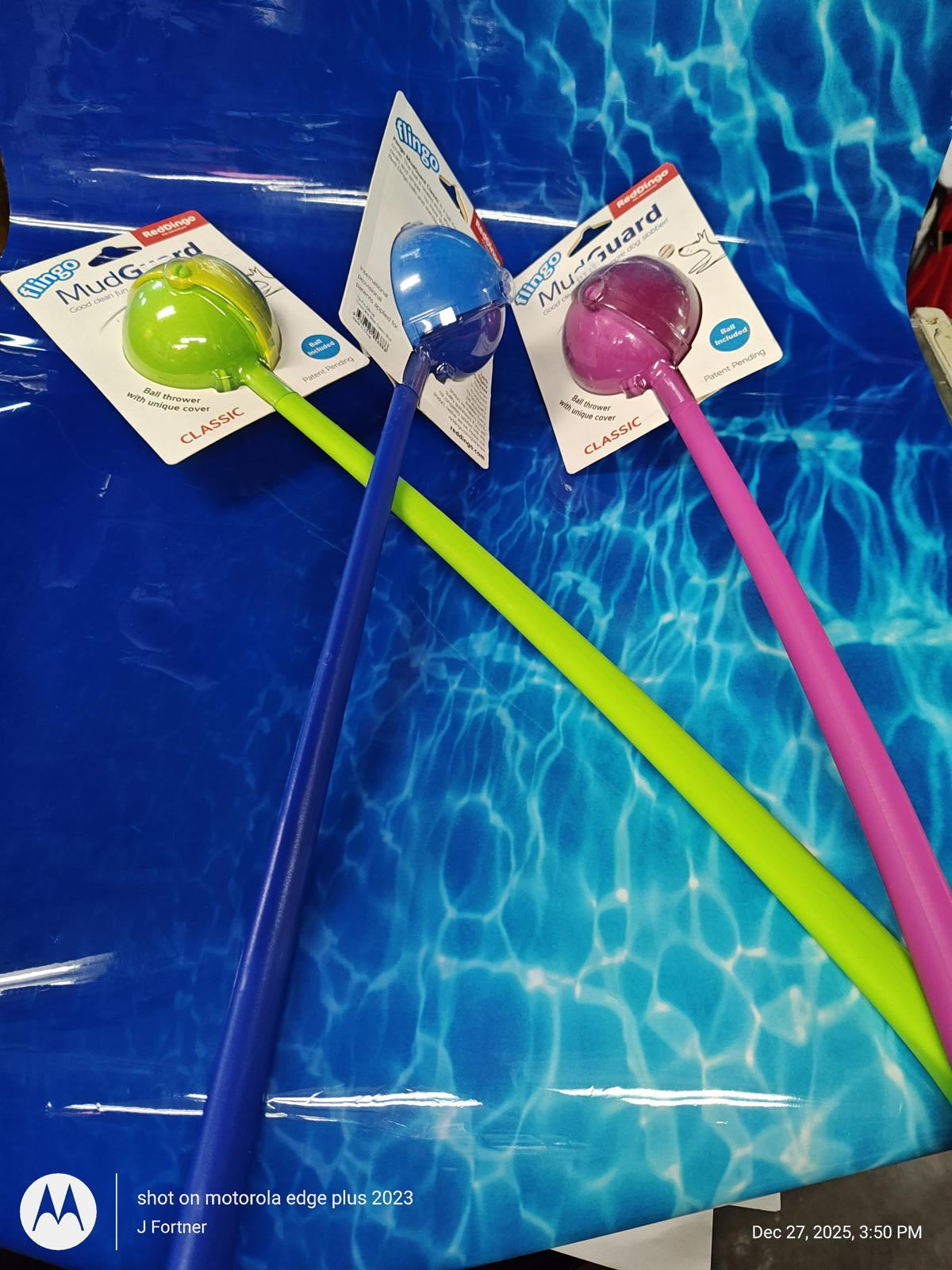 MultiGuard kitchen tool set featuring green, blue, and pink handles for easy cooking.