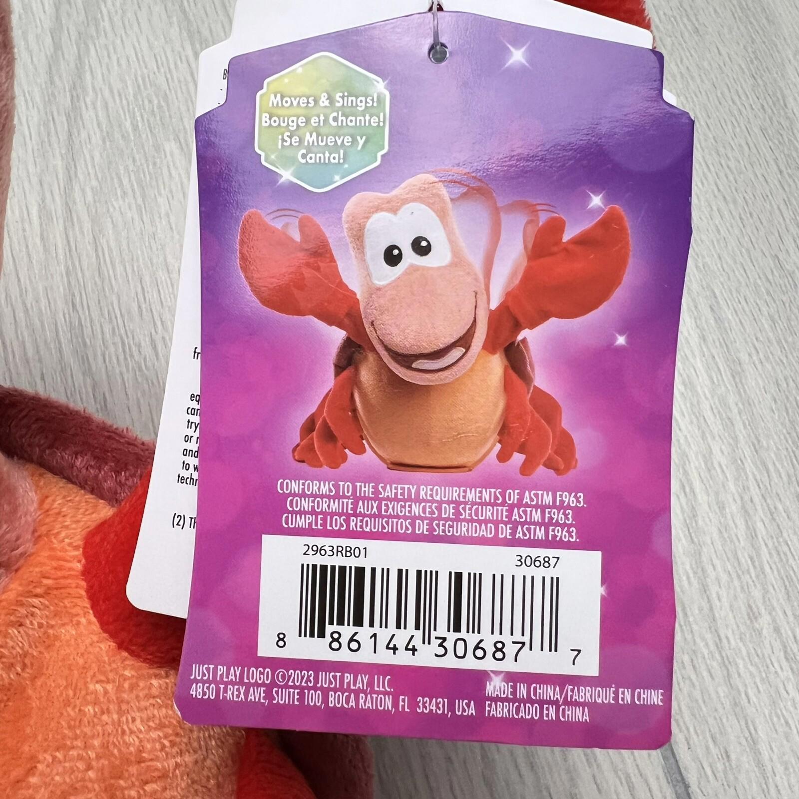 Muppet Baby plush toy featuring a red crab character with large eyes and claws.