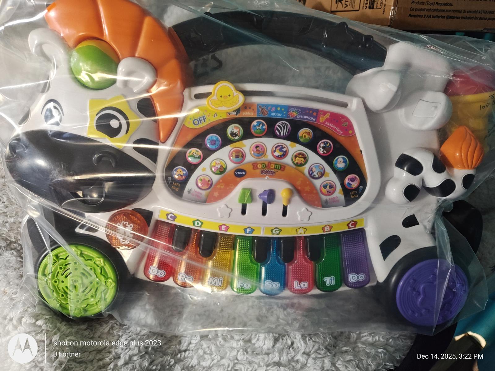 Musical Zebra Toy features colorful keys and interactive buttons for kids.