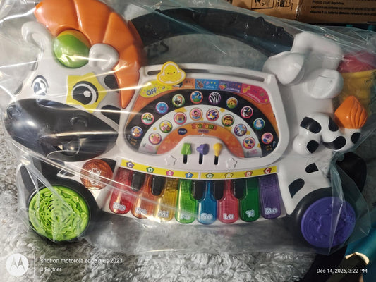 Musical Zebra Toy features colorful keys and interactive buttons for kids.