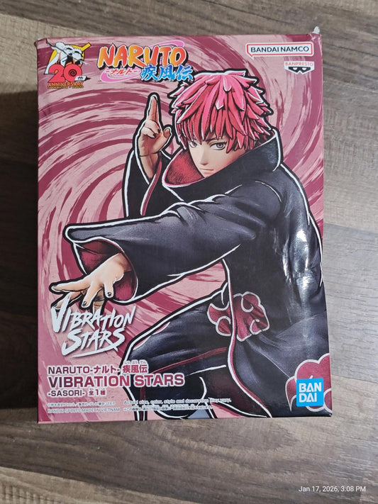 Naruto Vibraton Stars figure featuring a character with pink hair in a black coat.