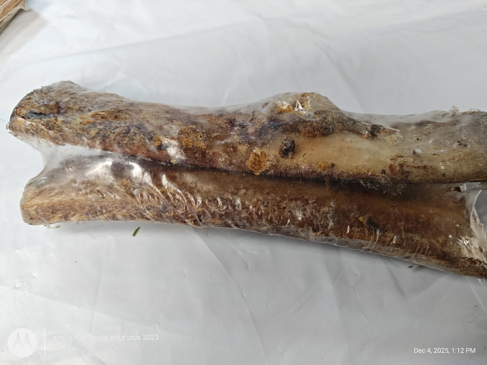 Natural Dog Chew Bones, two rawhide sticks wrapped in plastic for freshness.