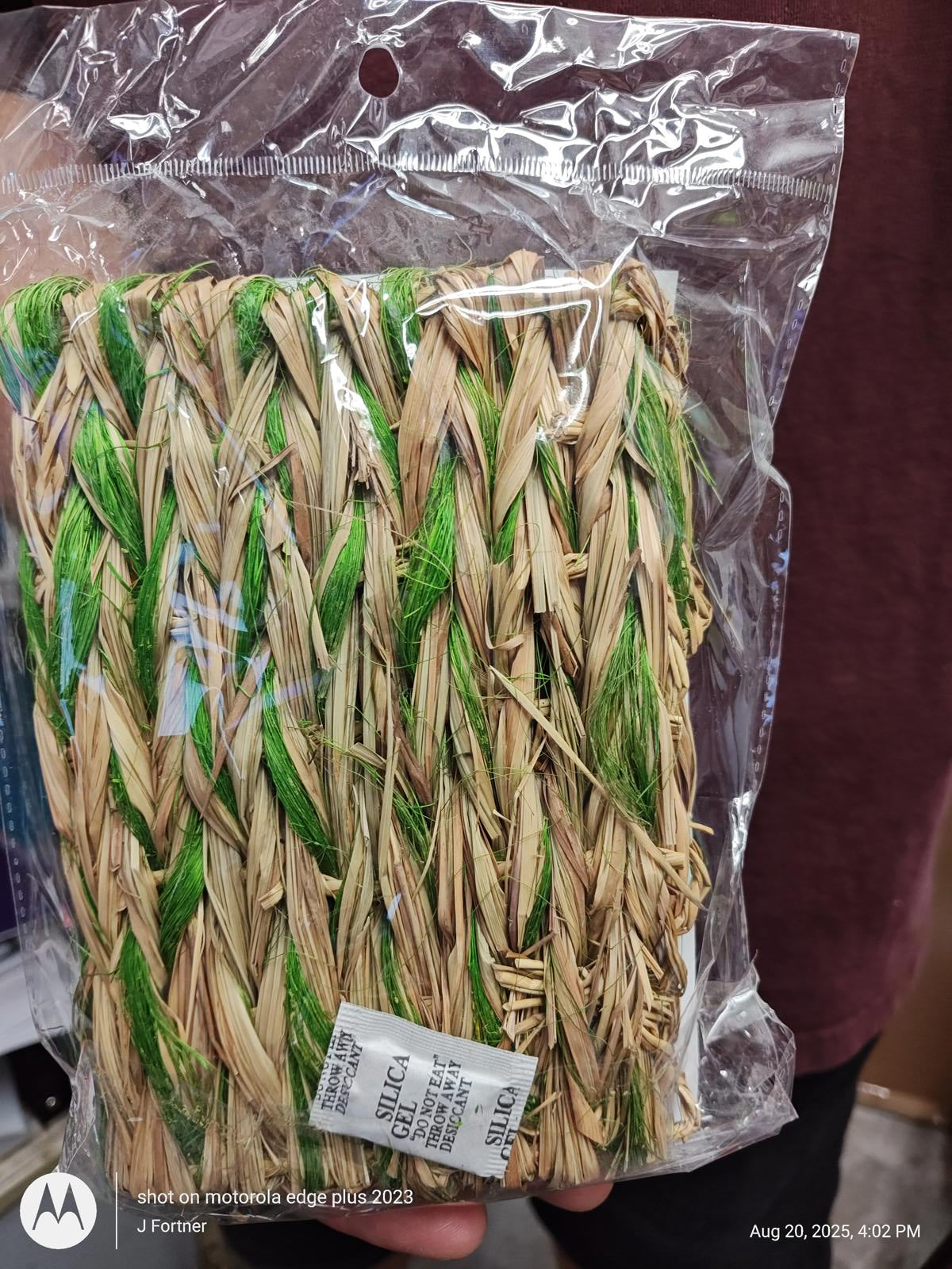 Natural Grass Matting Roll featuring green and beige woven strands for crafting.