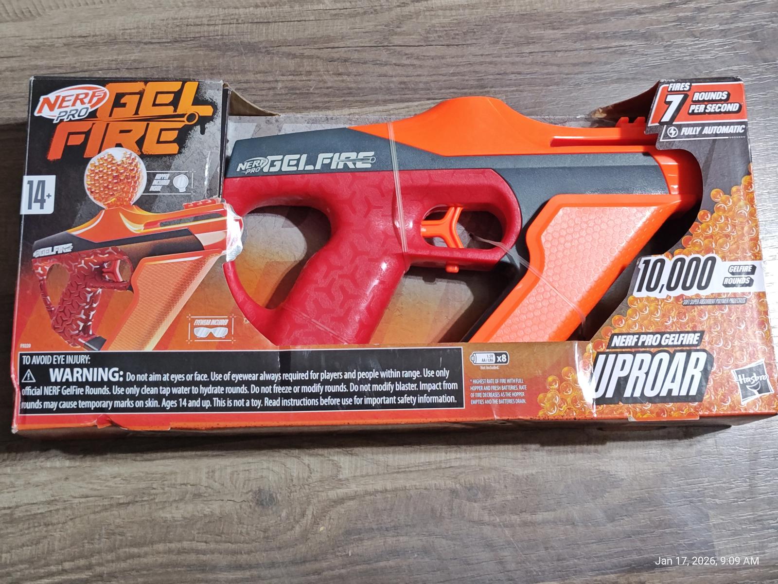 Nerf Gel Fire VIPROAR blaster in orange and gray packaging with red handle and gel balls.