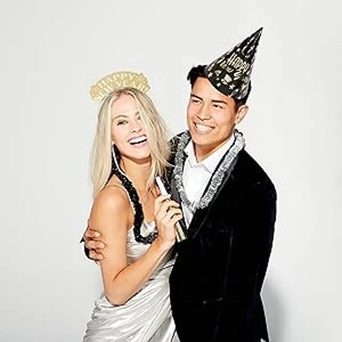 Party Celebration Accessories for New Year's Eve featuring a couple in festive attire.