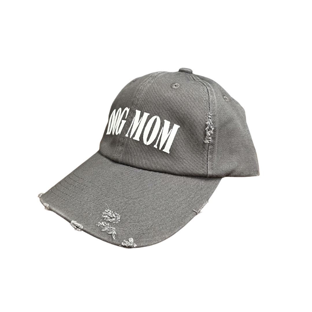 Dog Mom cap featuring a distressed gray design with bold white lettering.
