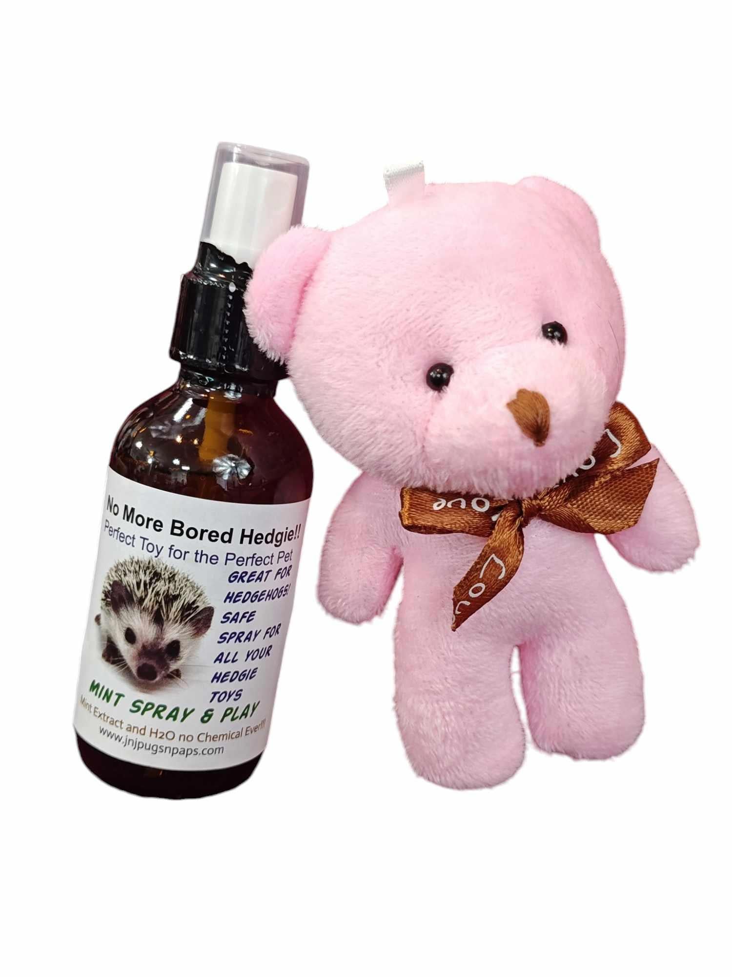 No More Bored Hedgehogs toy set featuring a pink plush bear and a spray bottle for pets.