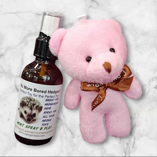 No More Bored Hedgehogs toy set includes a pink plush bear and spray for pets.