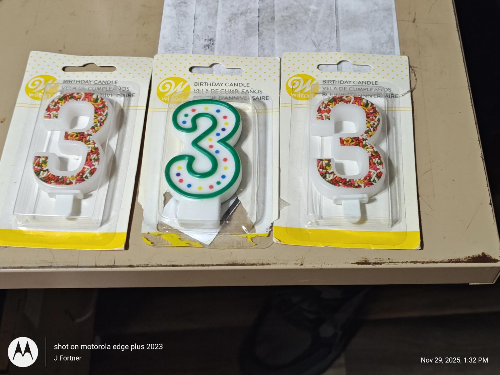 Number 3 birthday candles in colorful designs, perfect for celebrations.