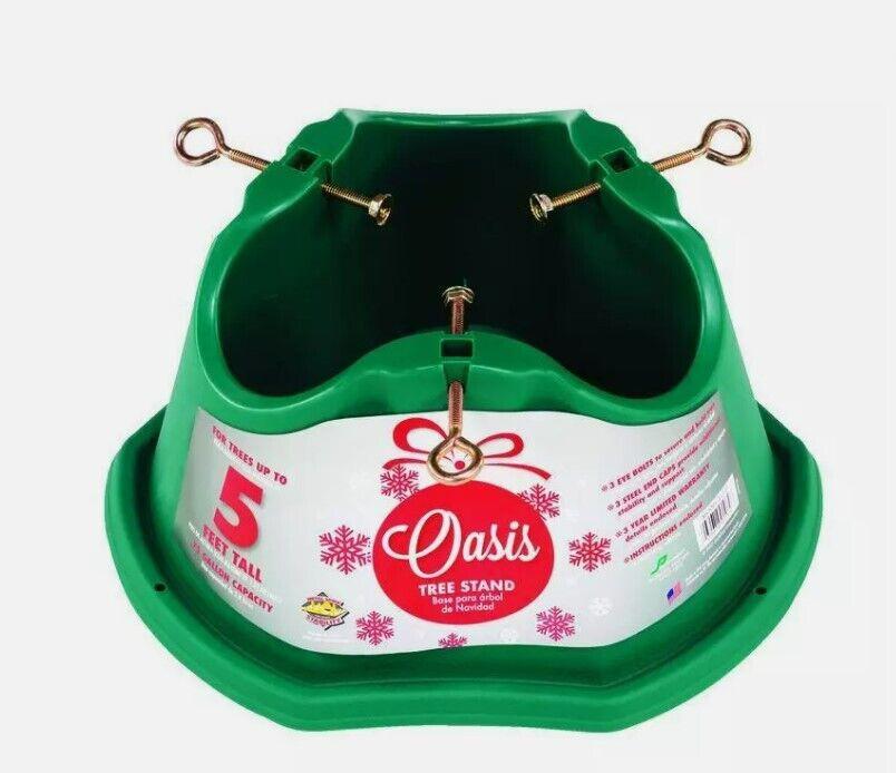 Oasis tree stand designed for secure support of Christmas trees, featuring a green base and adjustable screws.