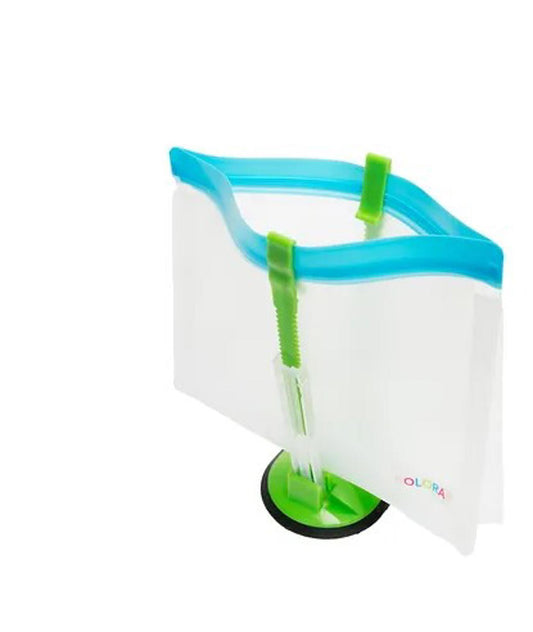 Olivia Stand-Up Pouch with blue zipper and green base for easy access.
