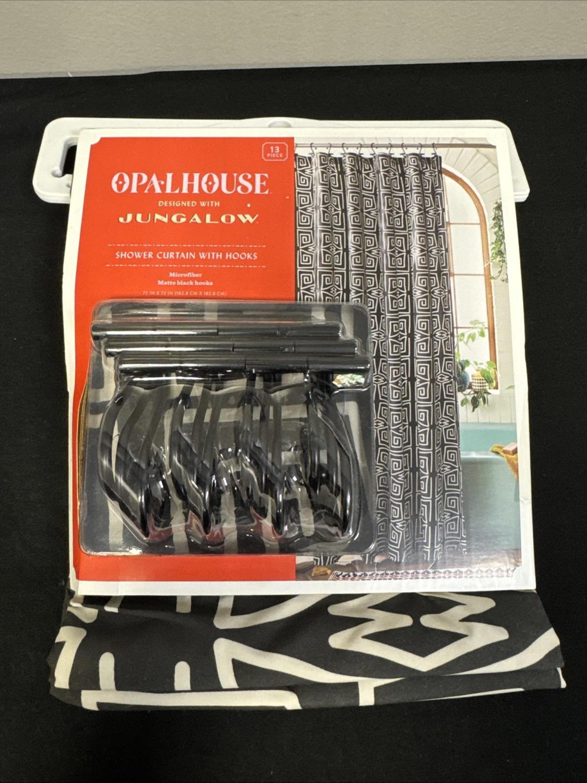 Opalhouse Jungalow shower curtain with hooks featuring a black and white geometric design.