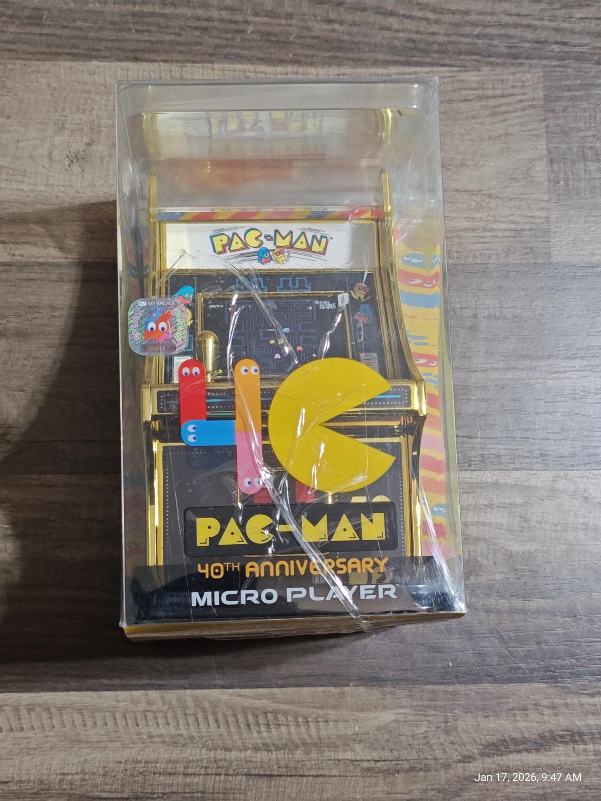 Pac-Man 40th Anniversary Micro Player in original packaging with vibrant colors and classic design.