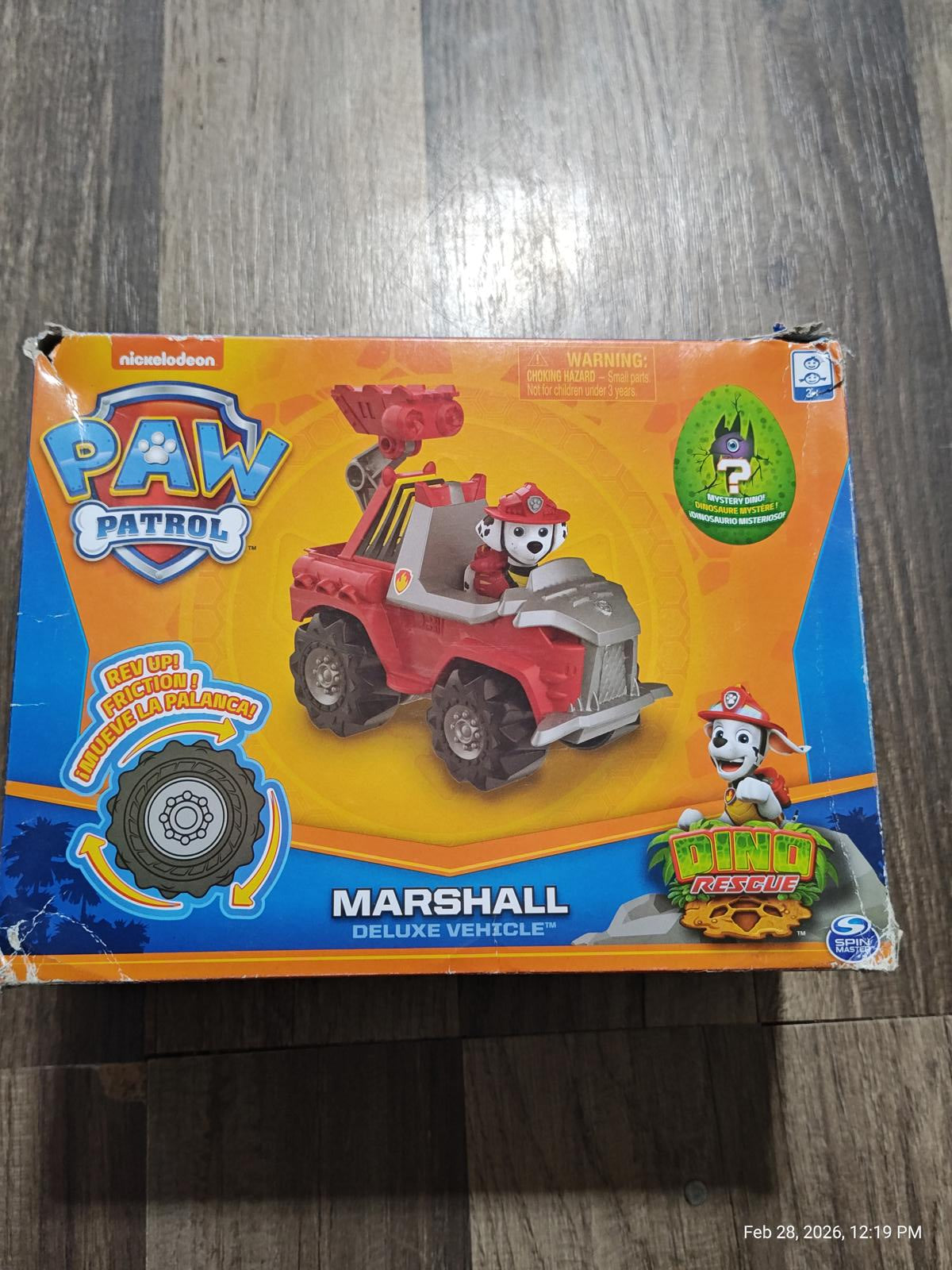 Paw Patrol Marshall deluxe vehicle in red with a fireman theme and a rescue ladder.