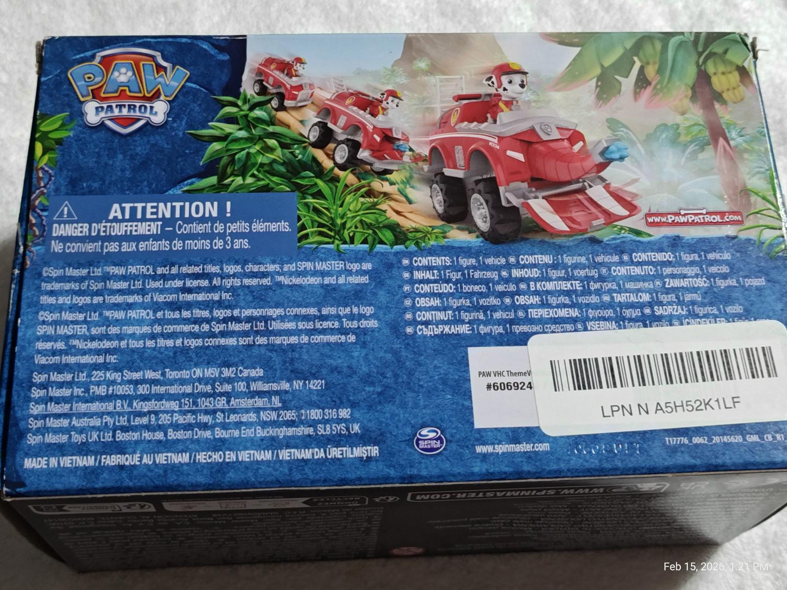 PAW Patrol vehicle set featuring red cars and characters in a jungle setting.