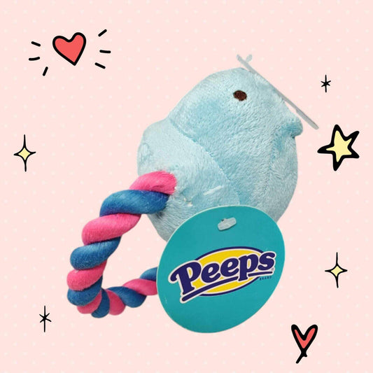 Peeps plush toy with a blue bird design and a pink and blue rope handle.