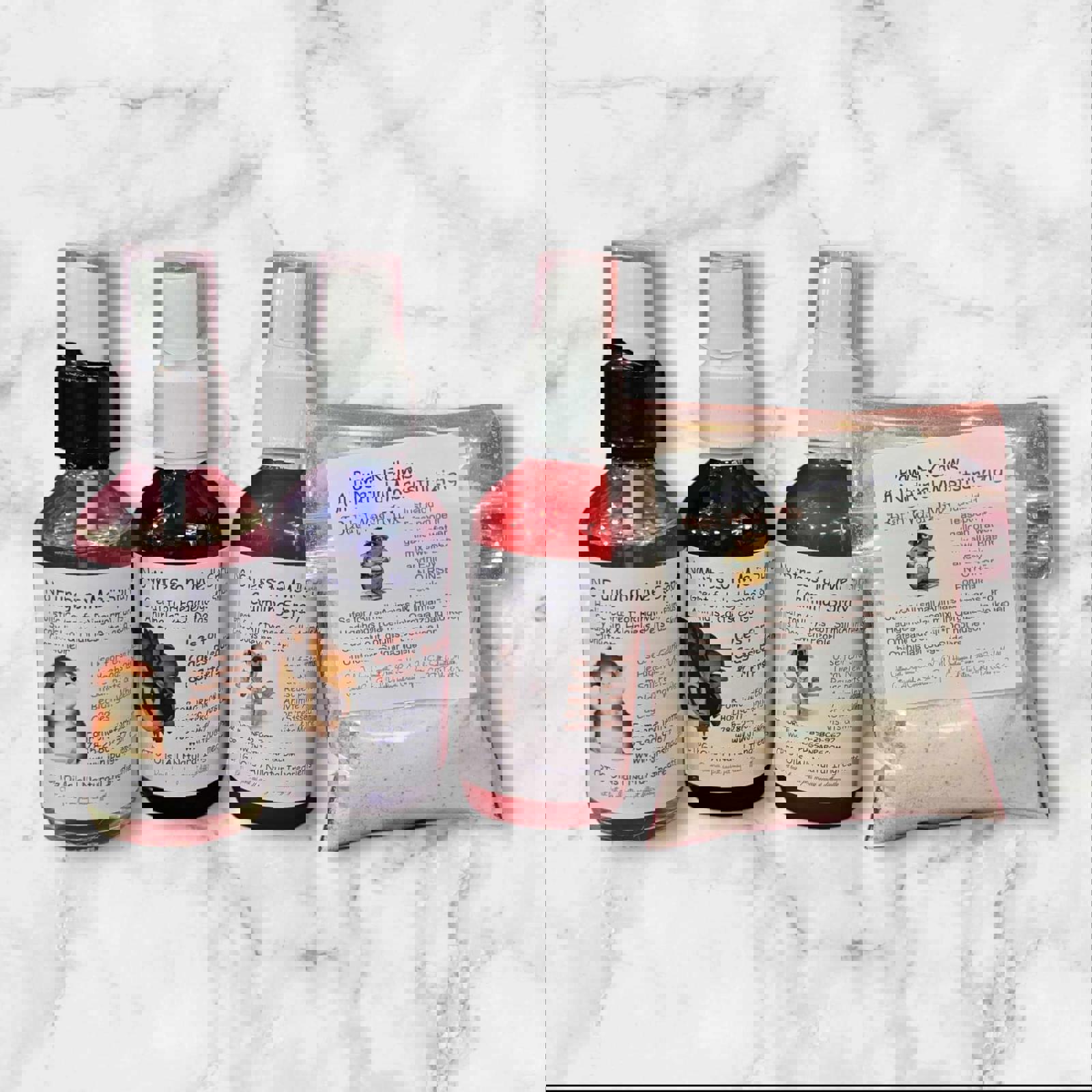 Pet Care Spray Set includes three bottles for various pet needs and a herbal powder for grooming.