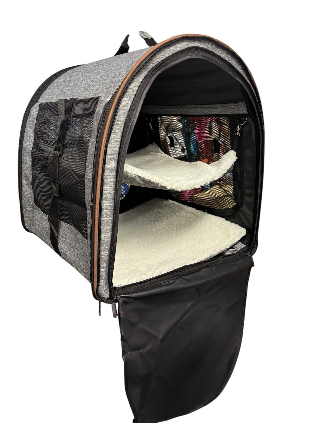Pet Carrier Backpack features a spacious interior with soft shelves and a stylish gray exterior.
