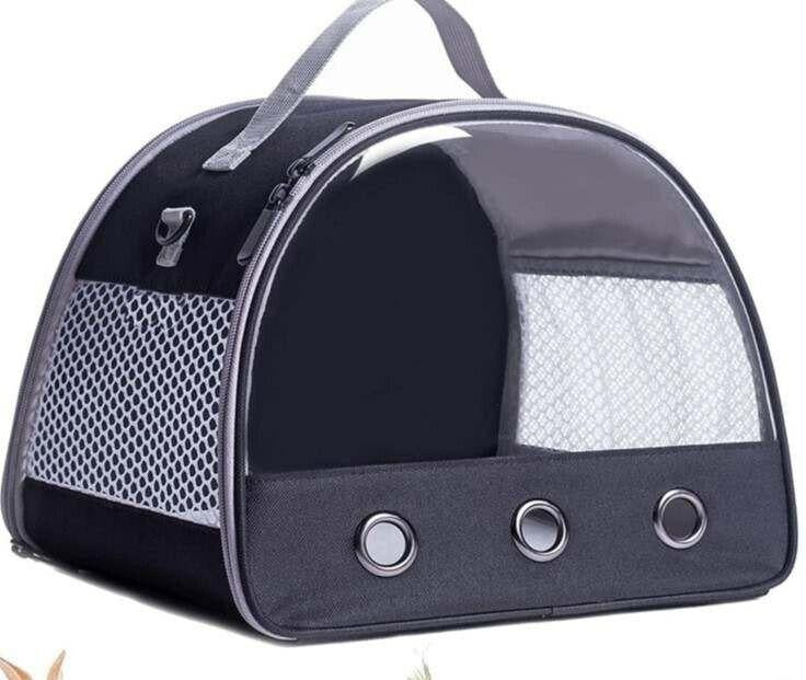 Pet Carrier Bag features a sleek black design with mesh panels for ventilation.