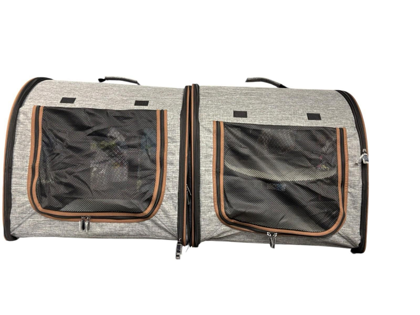 Pet Carrier Bag features dual compartments with mesh windows for ventilation.