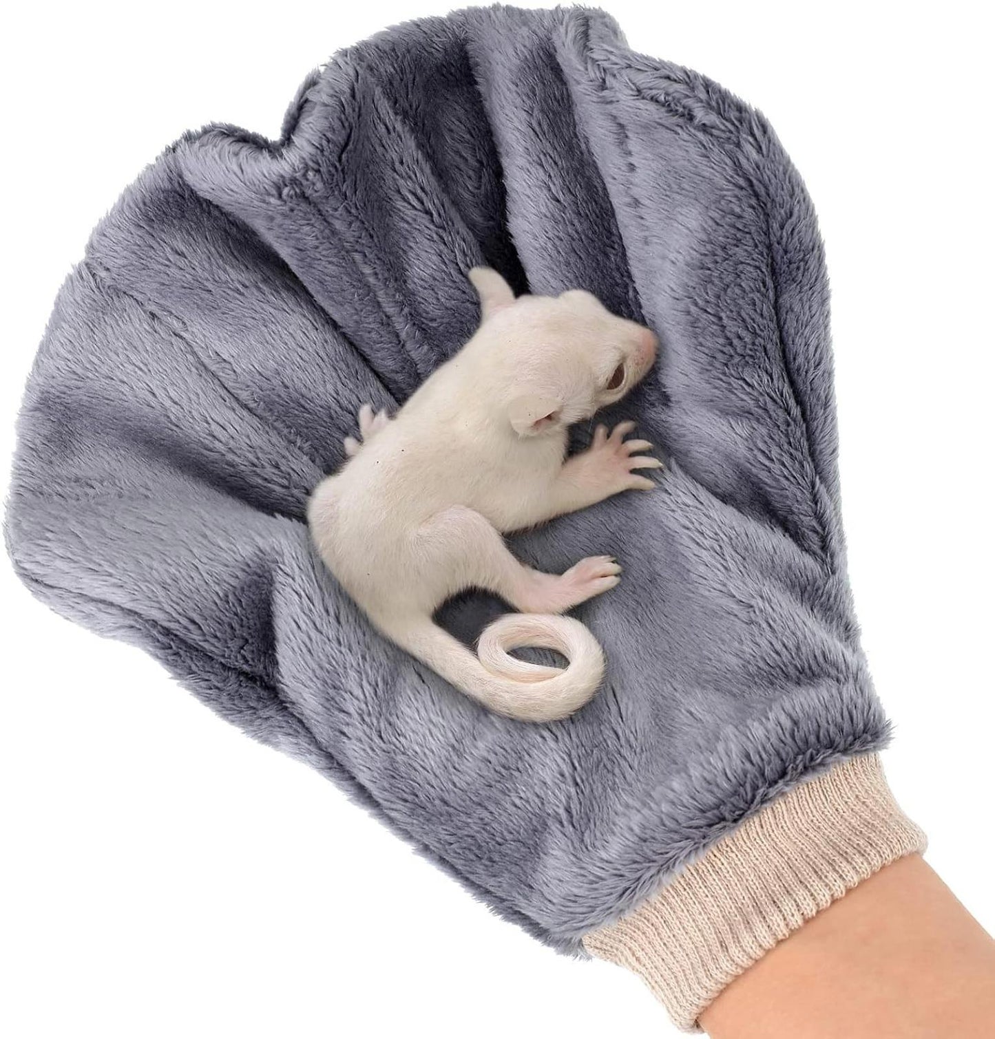 Pet grooming glove featuring a soft, gray texture with a small white animal resting inside.