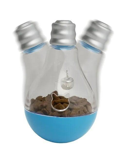 Pet Treat Dispenser features a unique light bulb design with a blue base and transparent container.