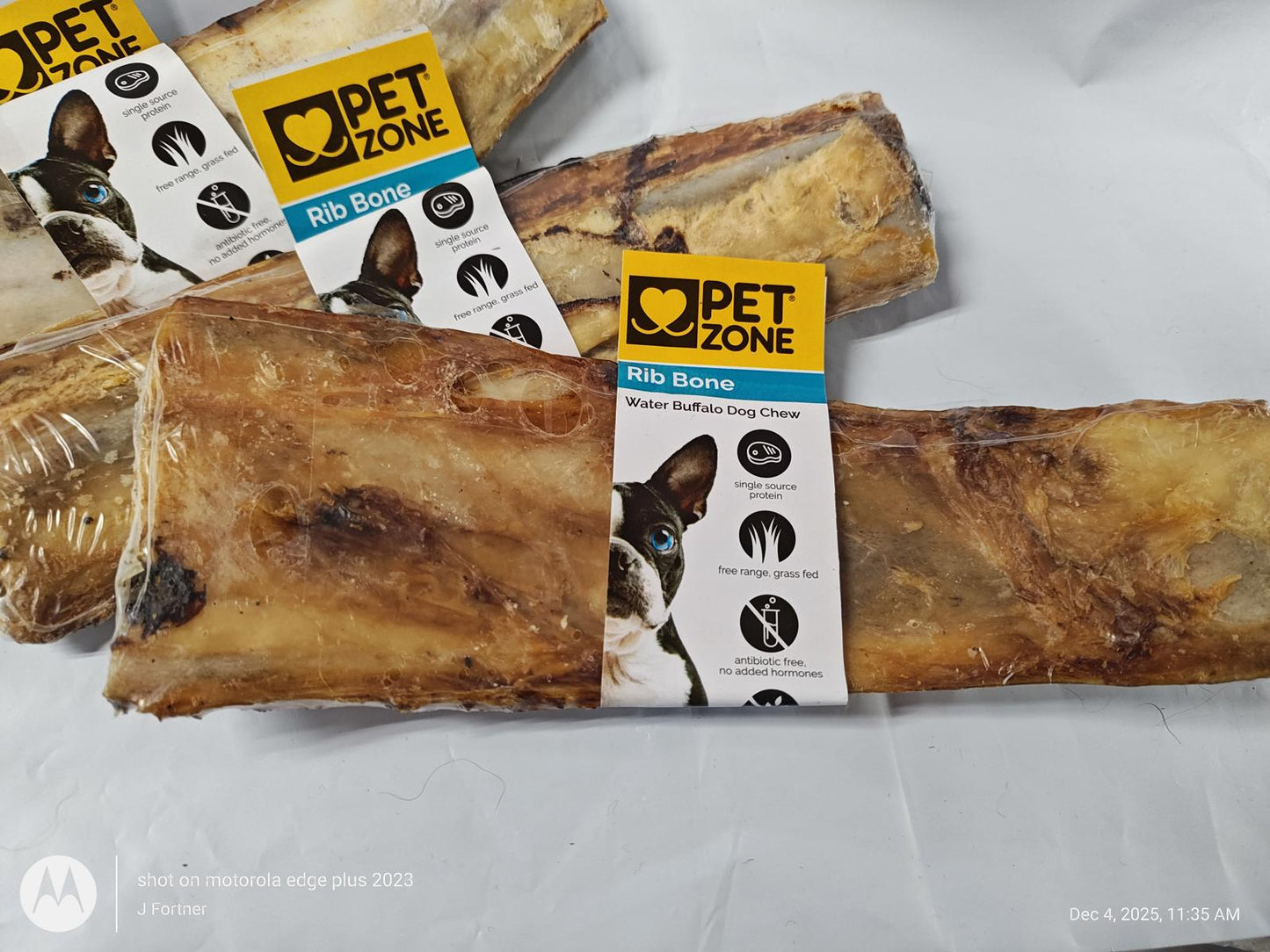 Pet Zone bully bone chew for dogs, featuring a natural texture and packaging with a cat image.