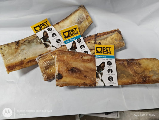 Pet Zone dog bone treats, three large bones with packaging, ideal for chewing and dental health.