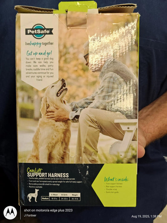 PetSafe Support Harness packaging featuring a golden retriever and a person outdoors.