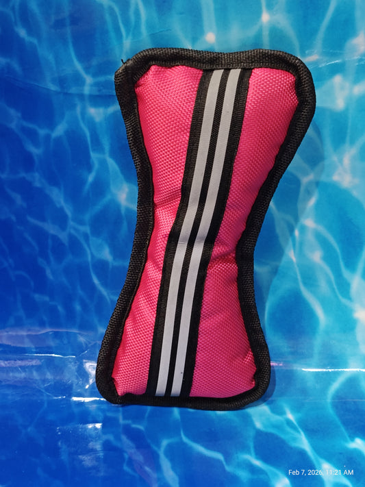 Pink Dog Toy with black trim and white stripes, perfect for playtime.