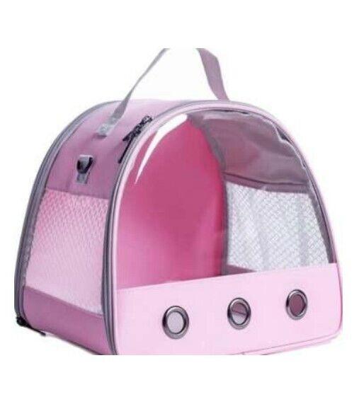 Pink Pet Carrier with Mesh Panels and Ventilation Holes.