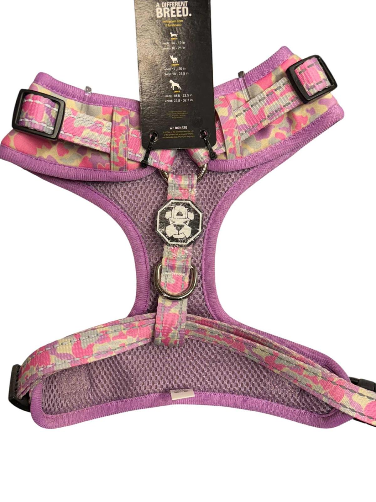 Pink and purple dog harness featuring a camouflage pattern and breathable mesh design.