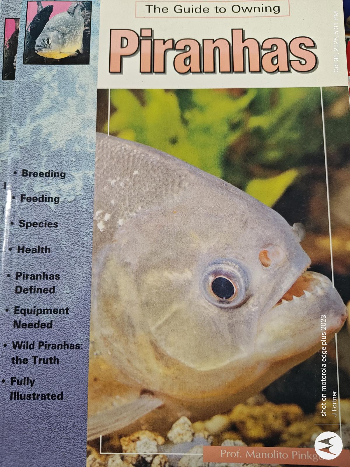 Piranhas book cover featuring a close-up of a piranha with vibrant colors and detailed illustrations.