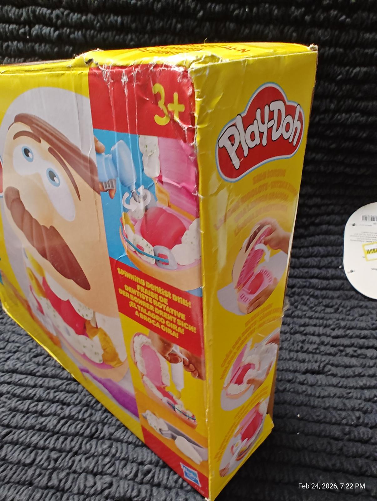 Play-Doh set featuring colorful molds and tools for creative play.