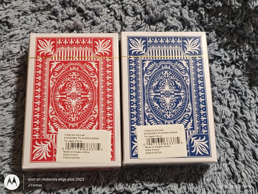 Playing cards set featuring red and blue designs with intricate patterns.