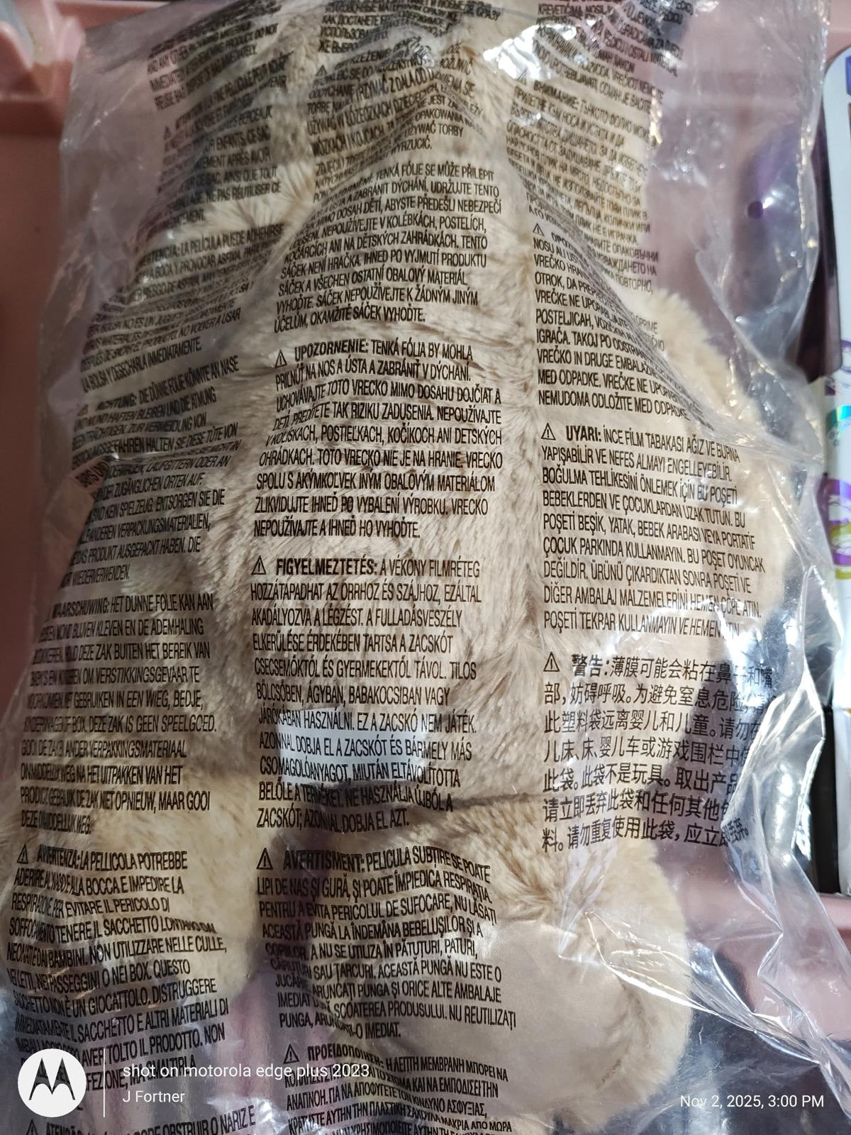 Plush Bear Toy in packaging, featuring soft fur and detailed stitching.