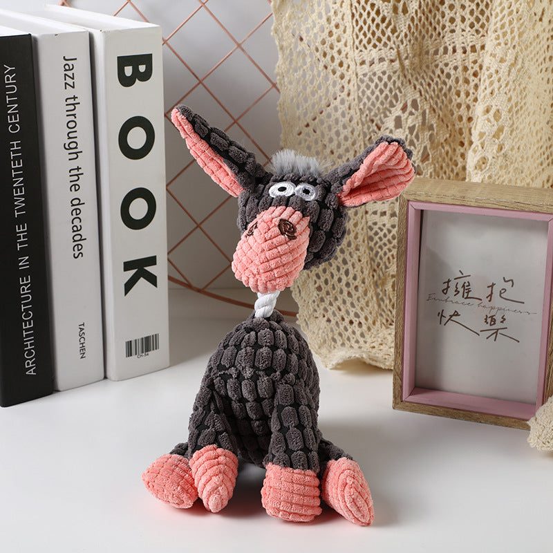 Plush Dog Toy featuring a gray and pink design, perfect for playful pets.