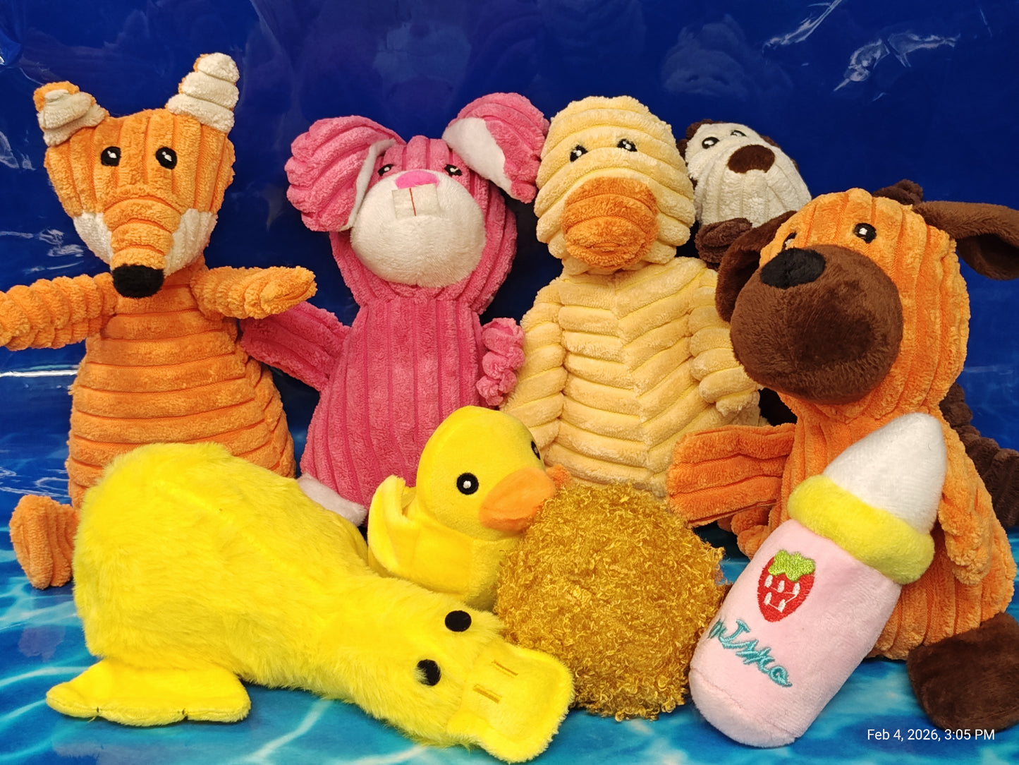 Plush Toy Set featuring colorful animals including a fox, rabbit, duck, and dog.