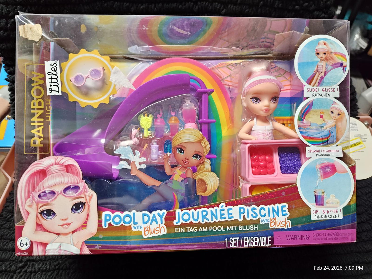 Pool Day playset featuring dolls, colorful accessories, and a fun pool theme.