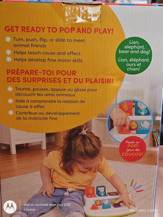 Pop and Play activity toy for toddlers, featuring colorful buttons and animal sounds.