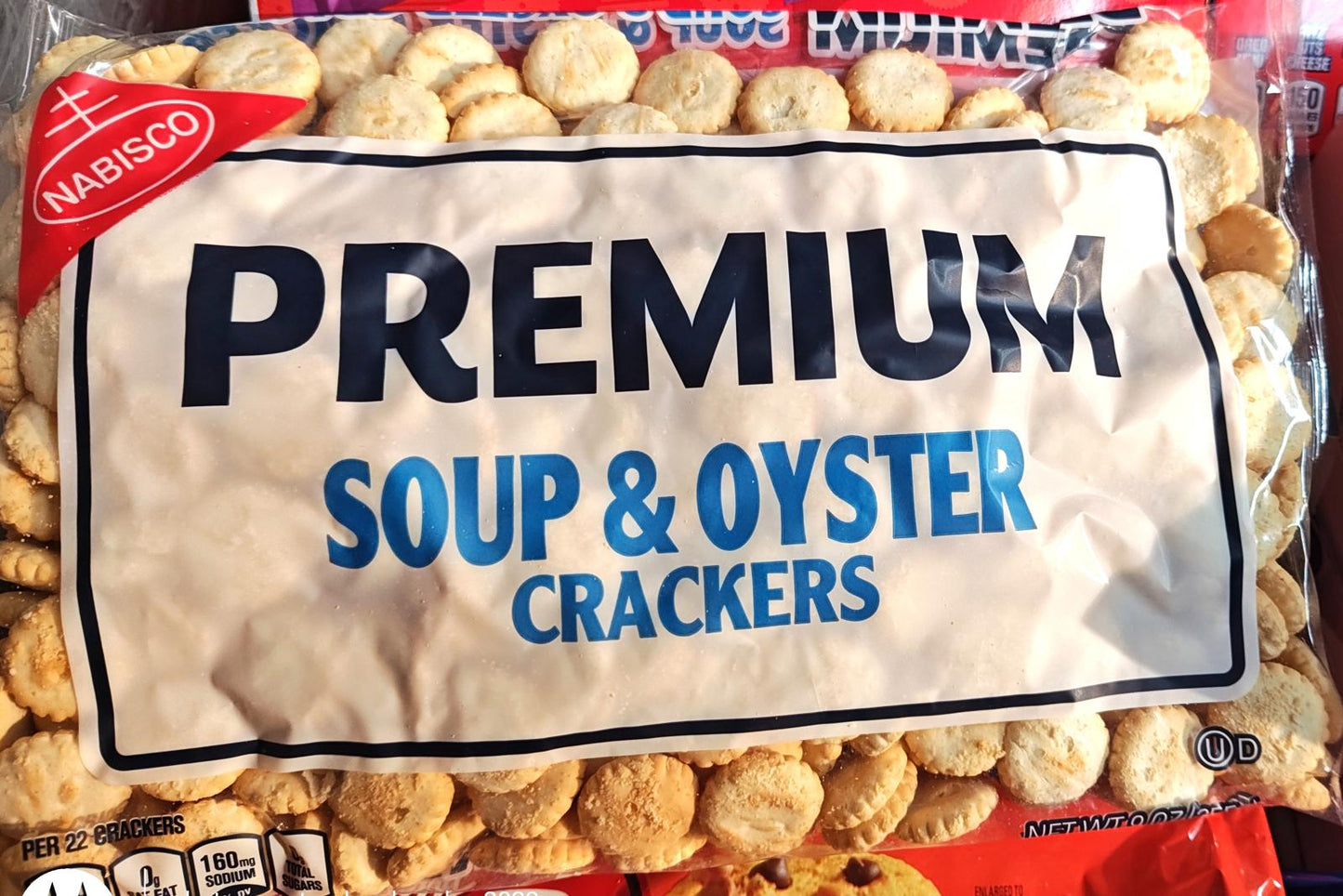 Premium Soup & Oyster Crackers in a clear package with a bold label.