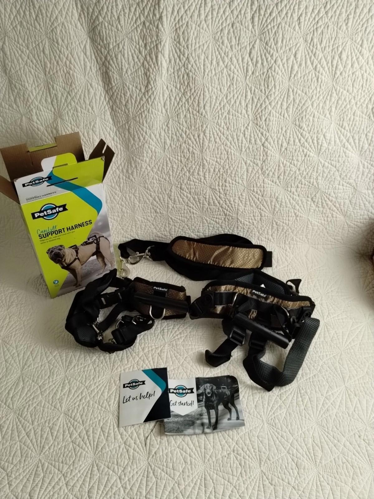 ProPet Adjustable Dog Harness with packaging and accessories displayed on a light background.
