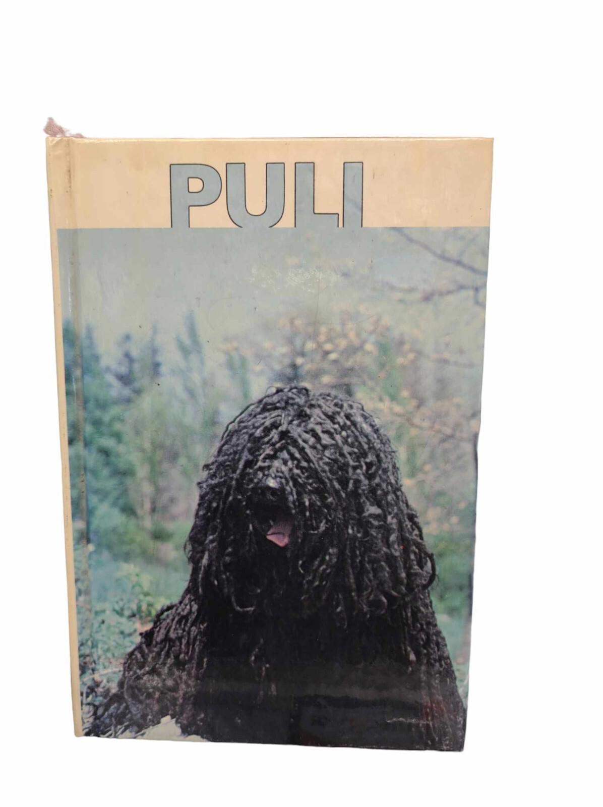 Puli book cover featuring a Puli dog with long, corded fur in a natural setting.