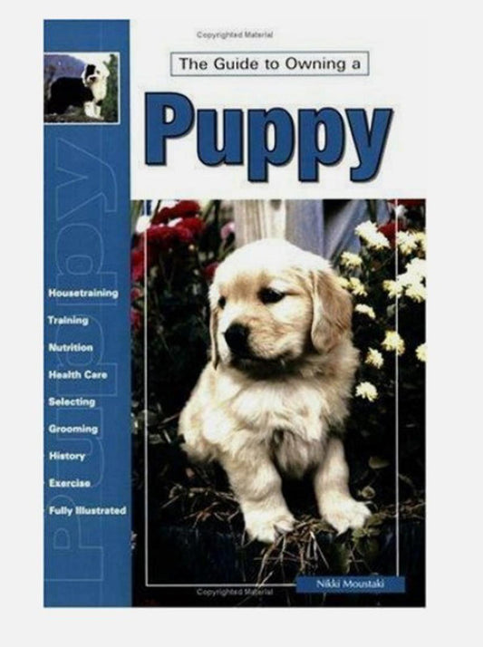 Puppy book cover featuring a golden retriever and tips on training and care.