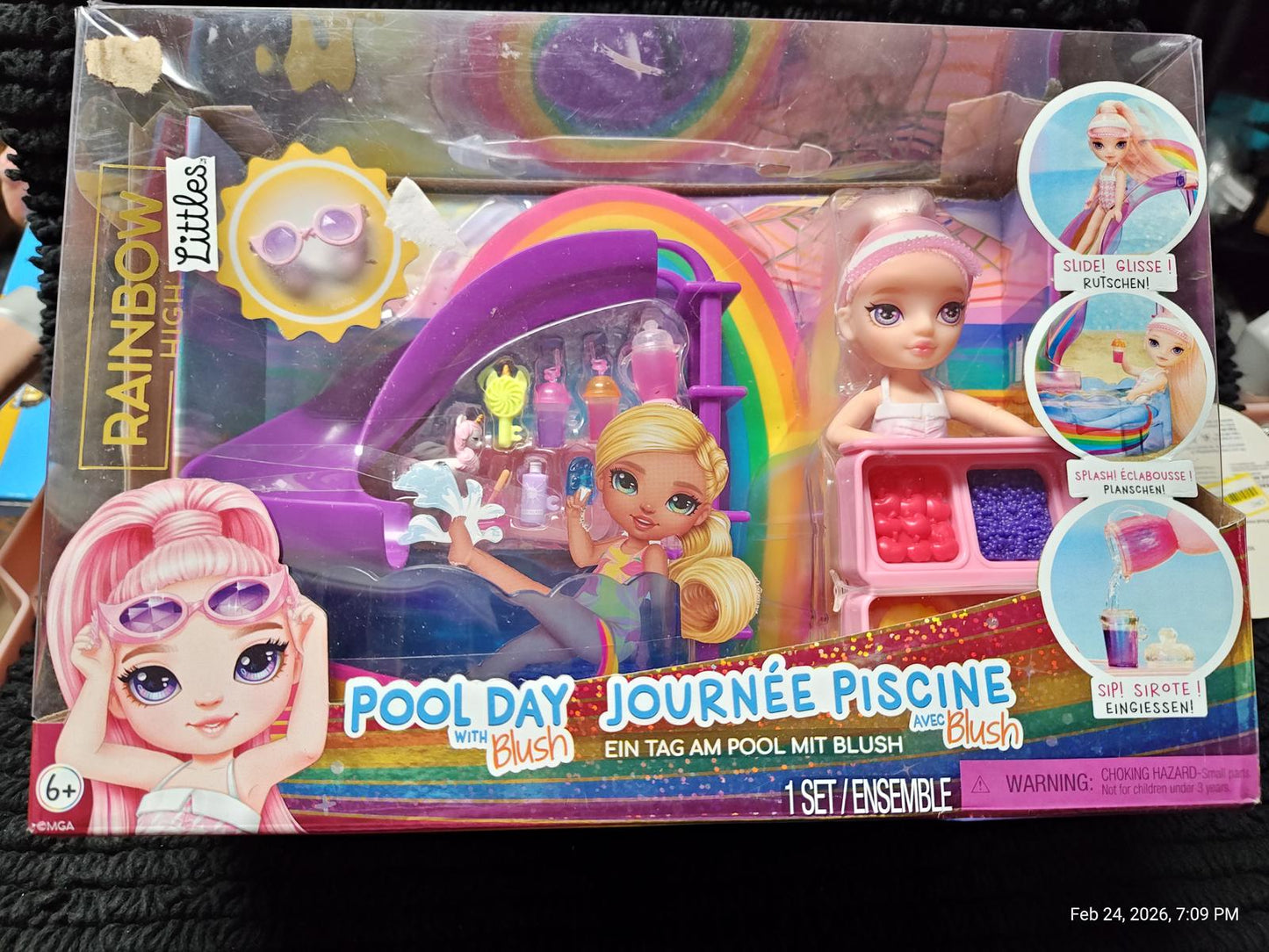 Rainbow High Pool Day playset featuring a colorful pool, doll, and accessories for imaginative fun.
