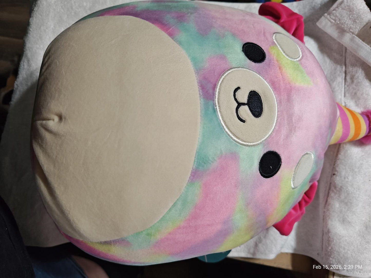 Rainbow Narwhal Plush Toy with a soft, colorful design and cute facial features.
