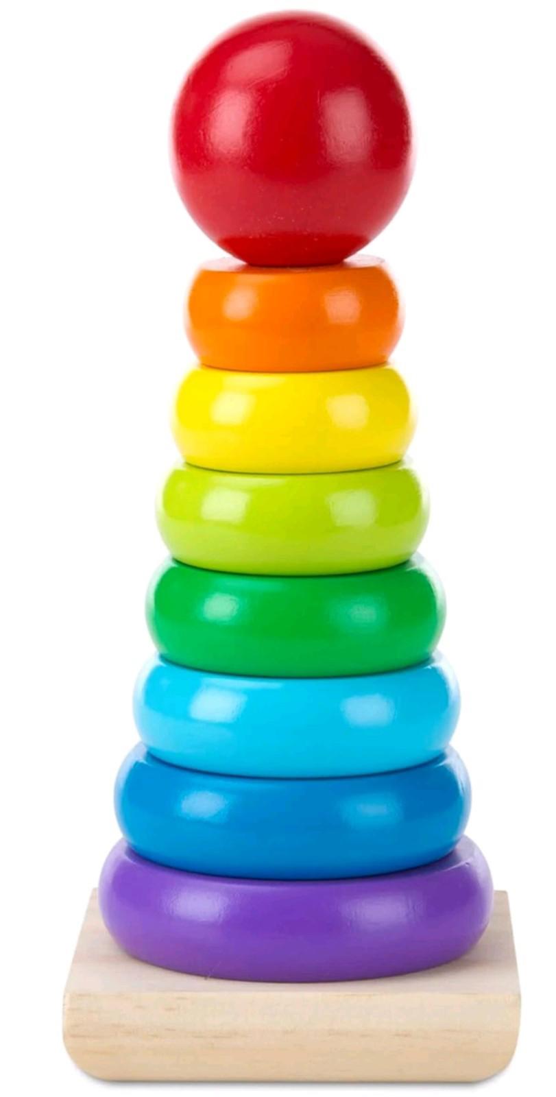 Rainbow Stacking Toy features colorful rings in vibrant hues, promoting fine motor skills.