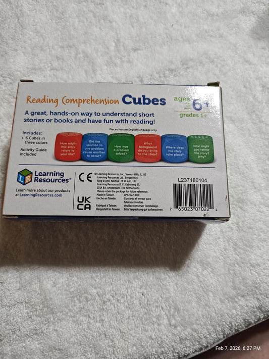 Reading Comprehension Cubes for ages 6+, featuring colorful dice for engaging storytelling.